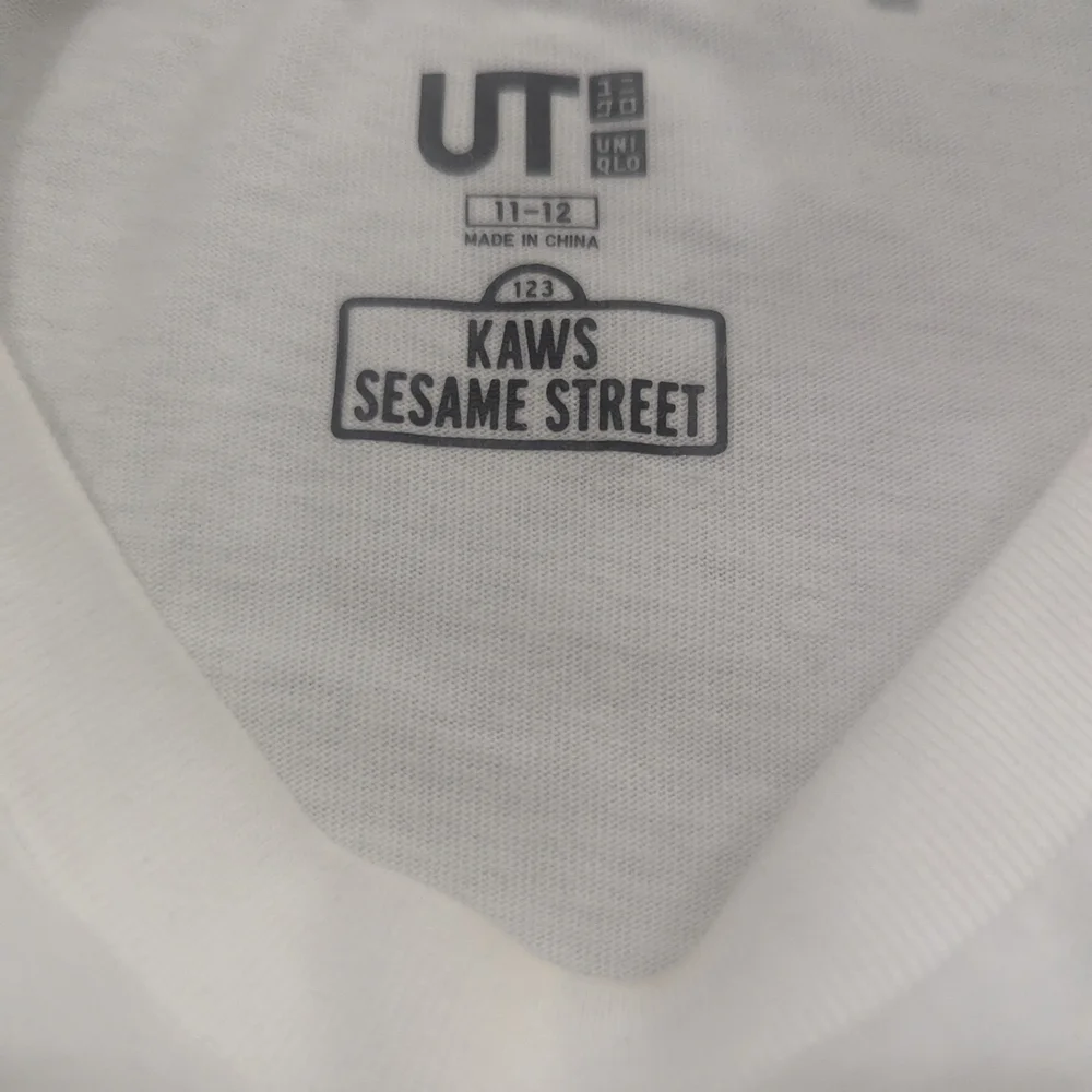 Uniqlo KAWS Sesame Street White UT T-Shirt